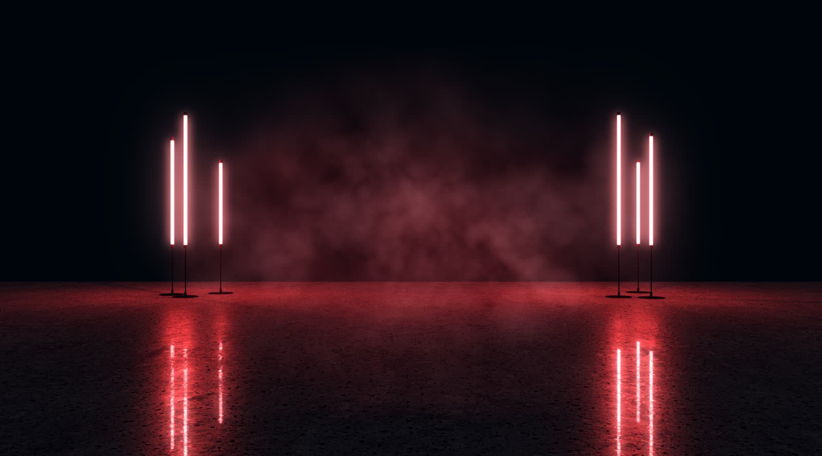 Red light pillars on a dark stage